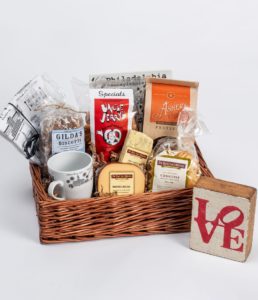 wicker gift basket with cheese coffee and biscotti