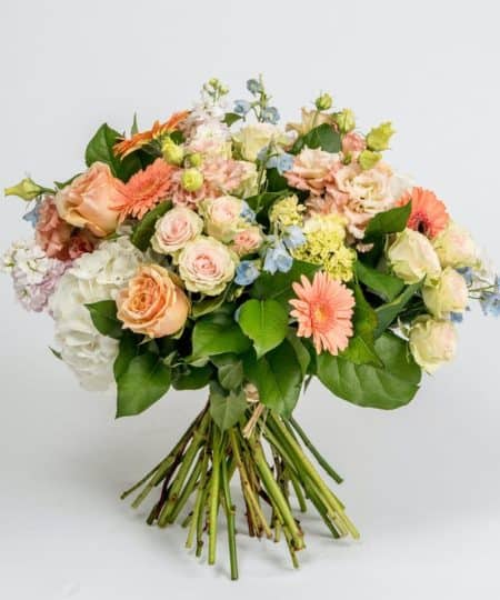 Allow our designers to hand pick a variety of fresh blooms in lovely pastel tones to create your custom garden bouquet. All Garden Bouquets are packed and delivered with a fresh water source and can be placed into your choice of container upon receipt. This gift does not come with a vase.