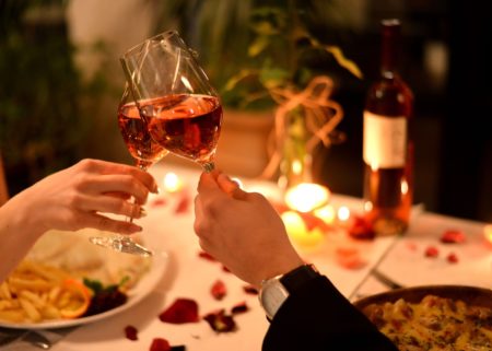Couple having romantic dinner with wine